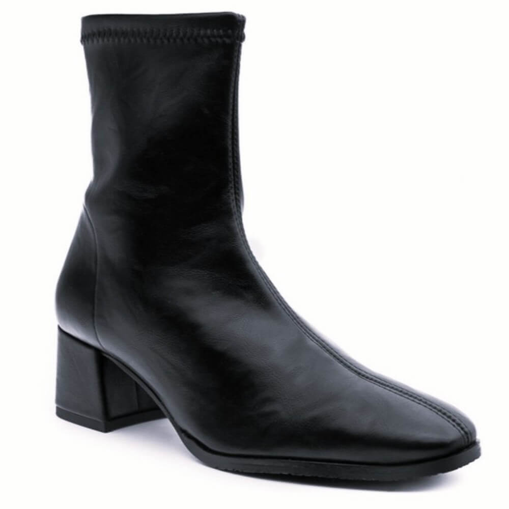 Black ankle boot with a block heel on a white background . Miss Elastic 78330 Ankle Boot