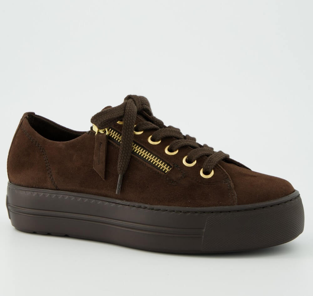 A Paul Green dark brown suede low-top sneaker with a matching dark brown platform sole, brown laces, and gold-tone metal eyelets and zipper accents, shown on a light grey background.