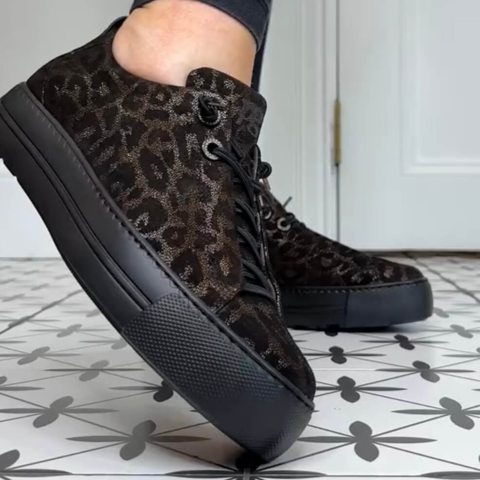 Leopard print sneaker with black sole. Paul Green 5417 Elastic Laces Glossy Leopard Bronze