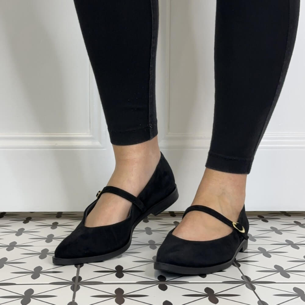 Paul Green 1127 Mary Jane Black shoes worn with black leggings.