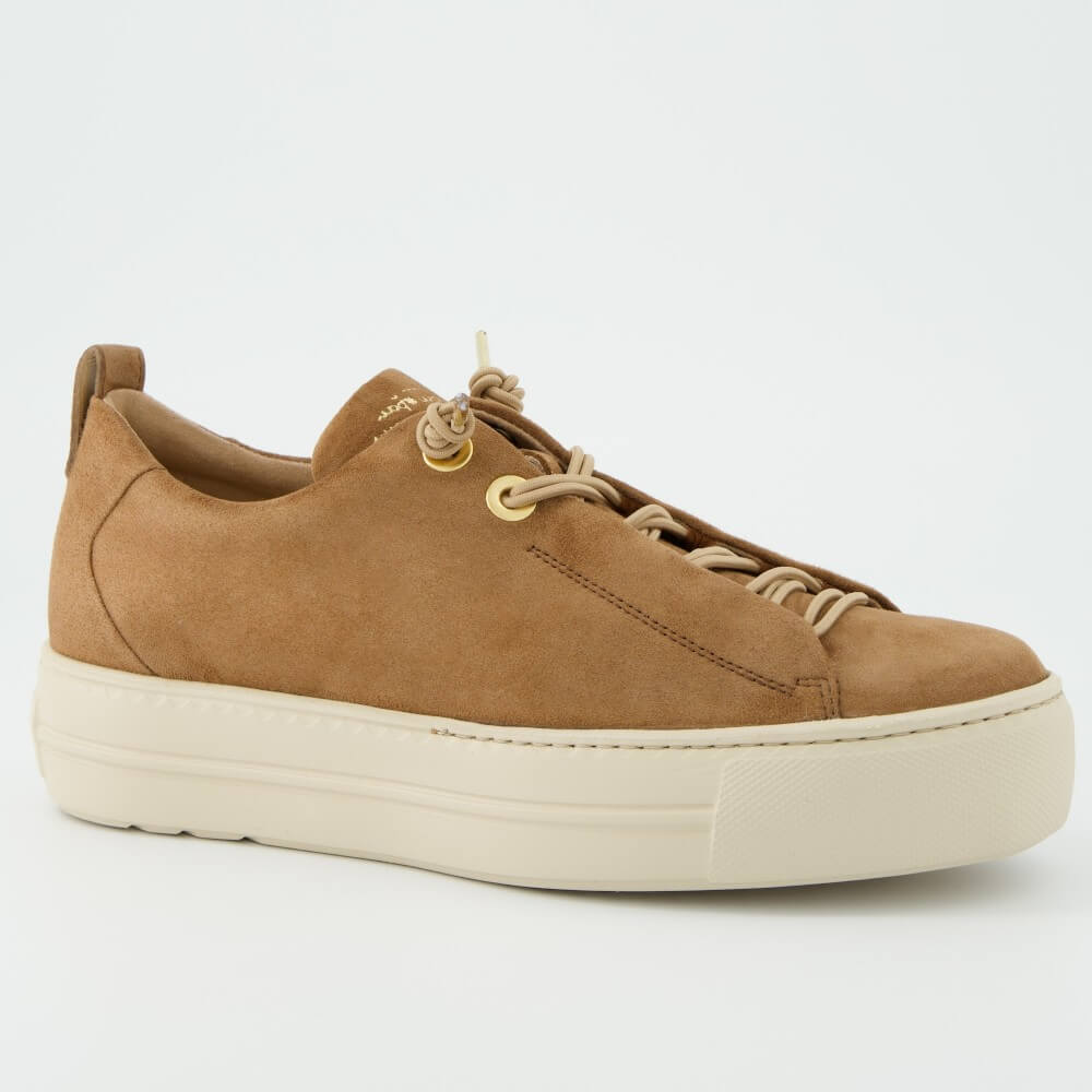 Brown suede sneaker with beige sole on a white background
