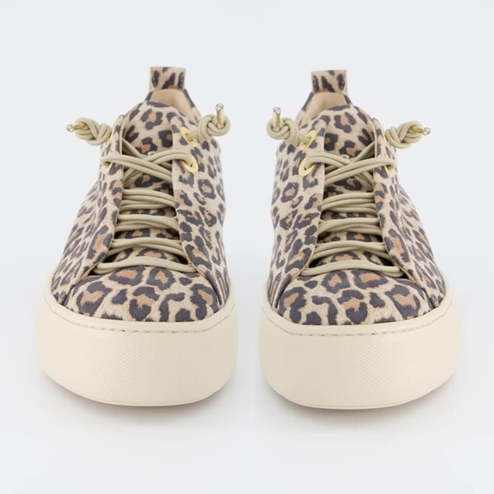 a pair of leopard print platform sneakers