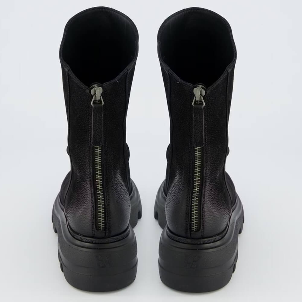 Black suede ankle boot with a back zipper and a thick sole on a light gray background