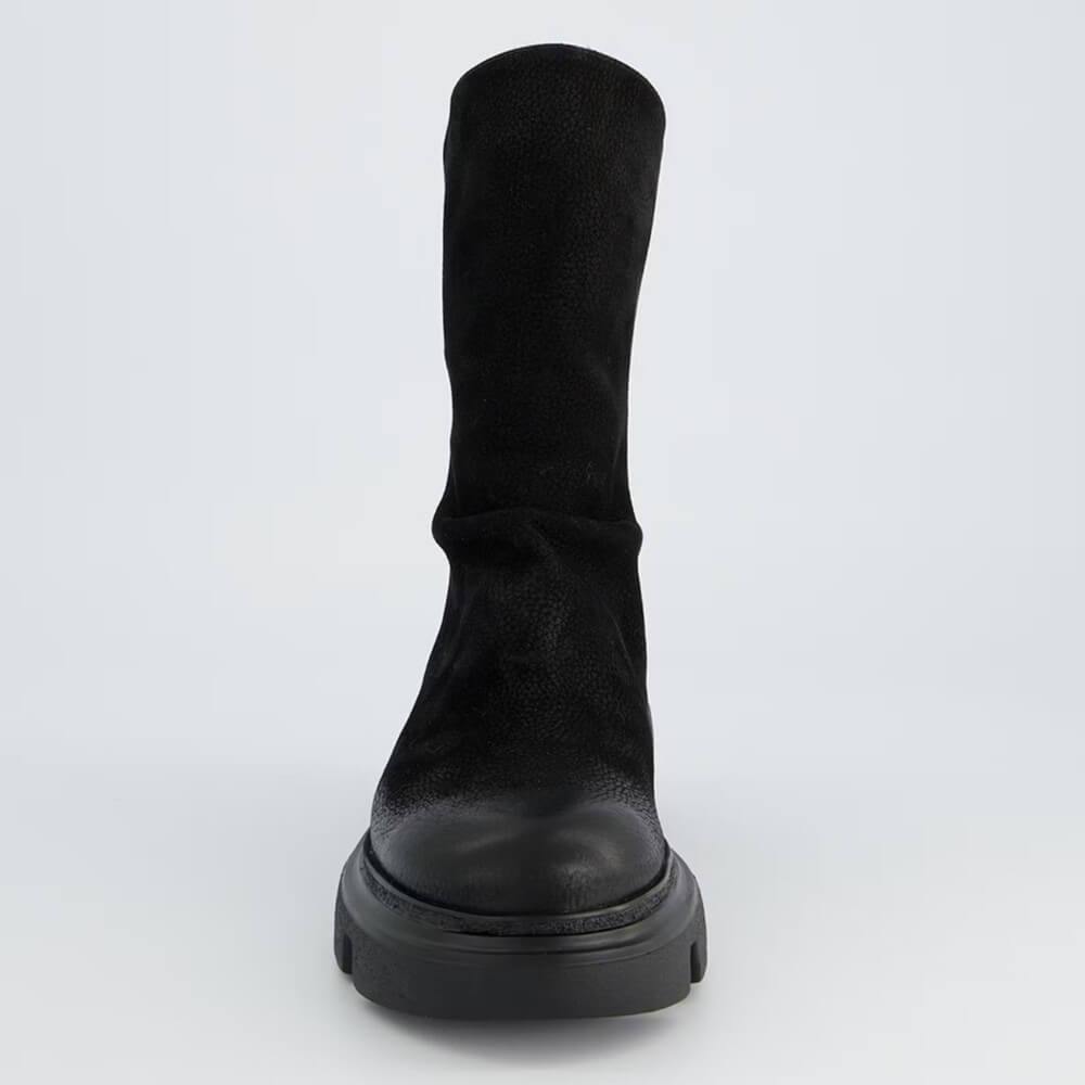 Black suede ankle boot with a back zipper and a thick sole on a light gray background