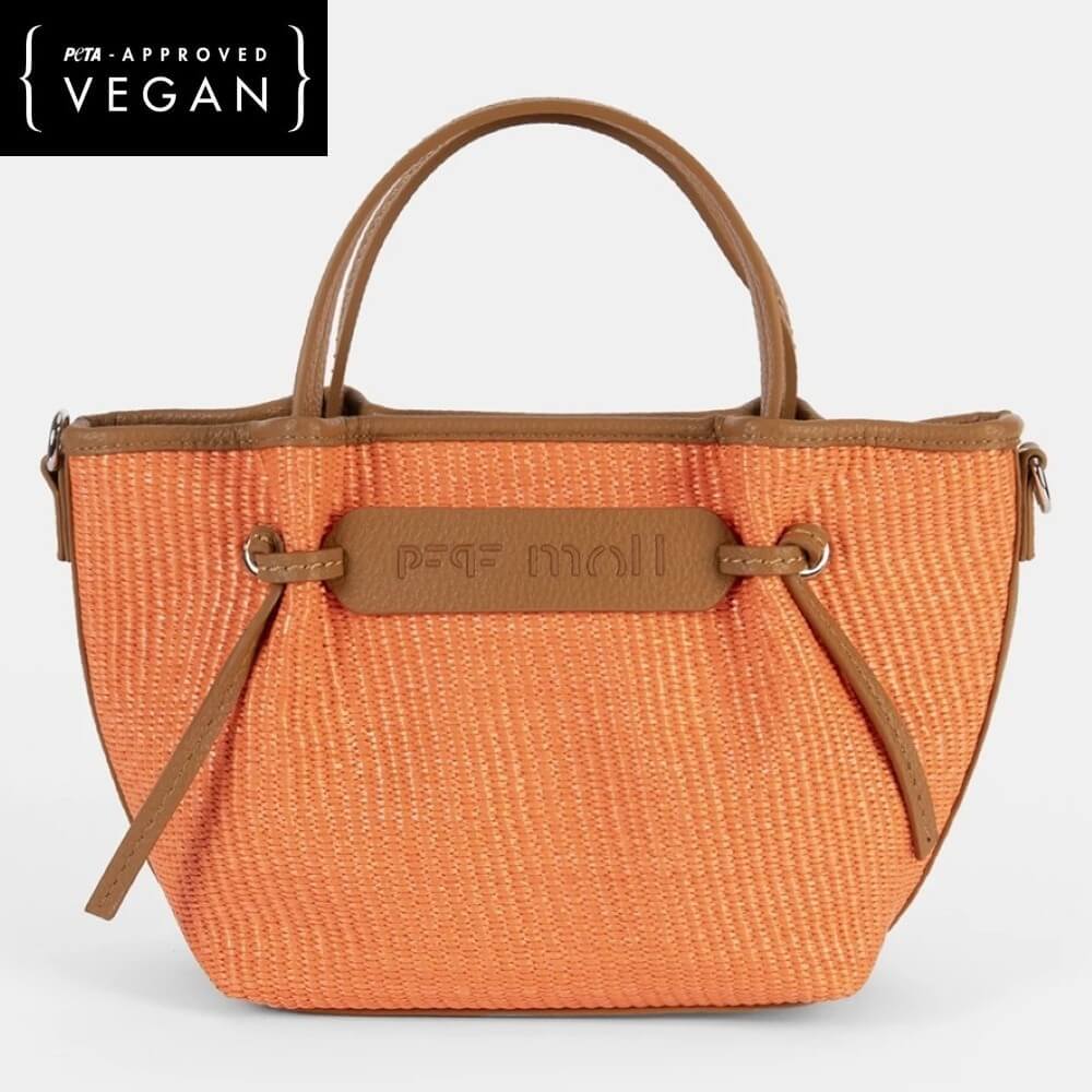 Orange woven handbag with brown handles and trim on a light gray background, featuring 'Pepe Moll' brand. Vegan