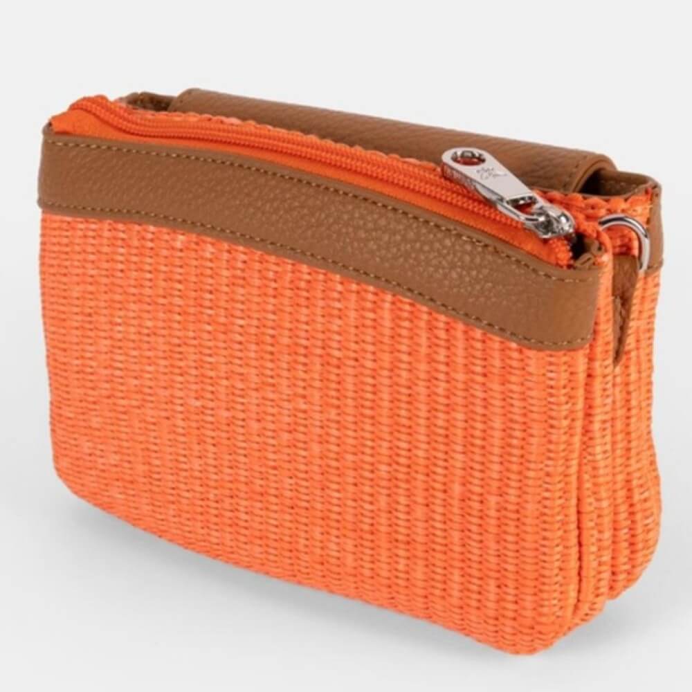 Orange crossbody bag with brown leather patch on a white background, featuring 'Pepe Moll ' branding. Vegan