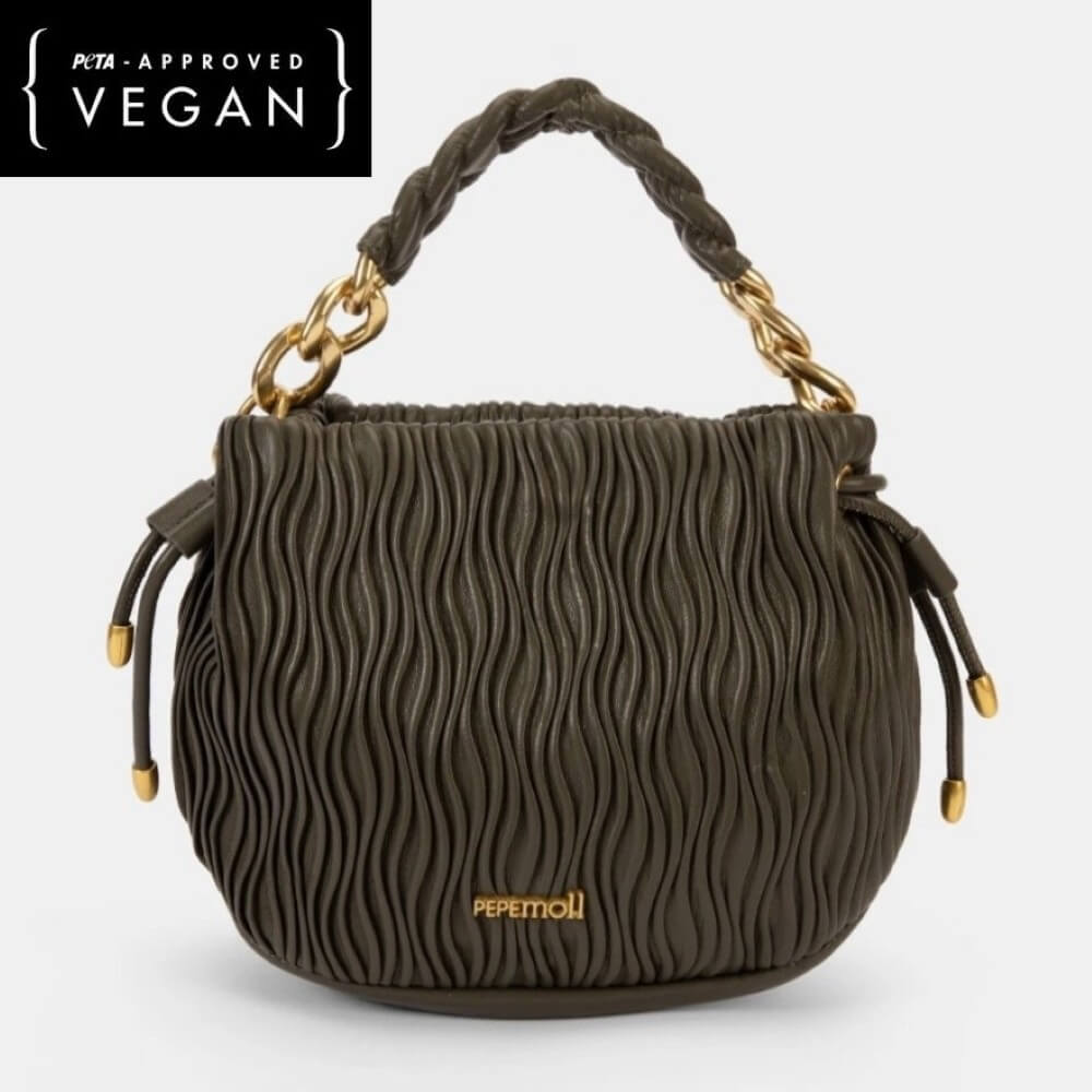 green textured handbag with gold chain handle on a white background, featuring PETA-approved vegan label.