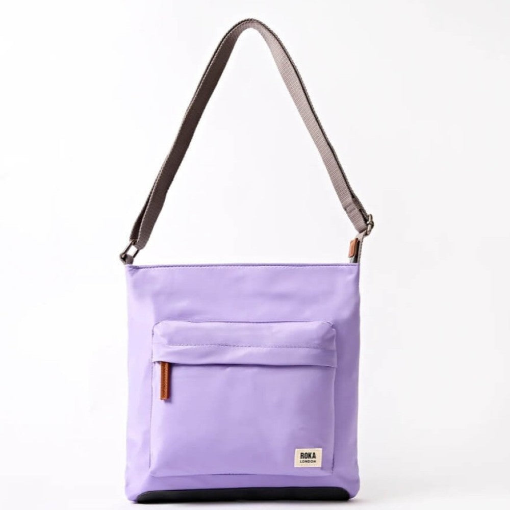 Roka Purple shoulder bag with a grey strap on a white background