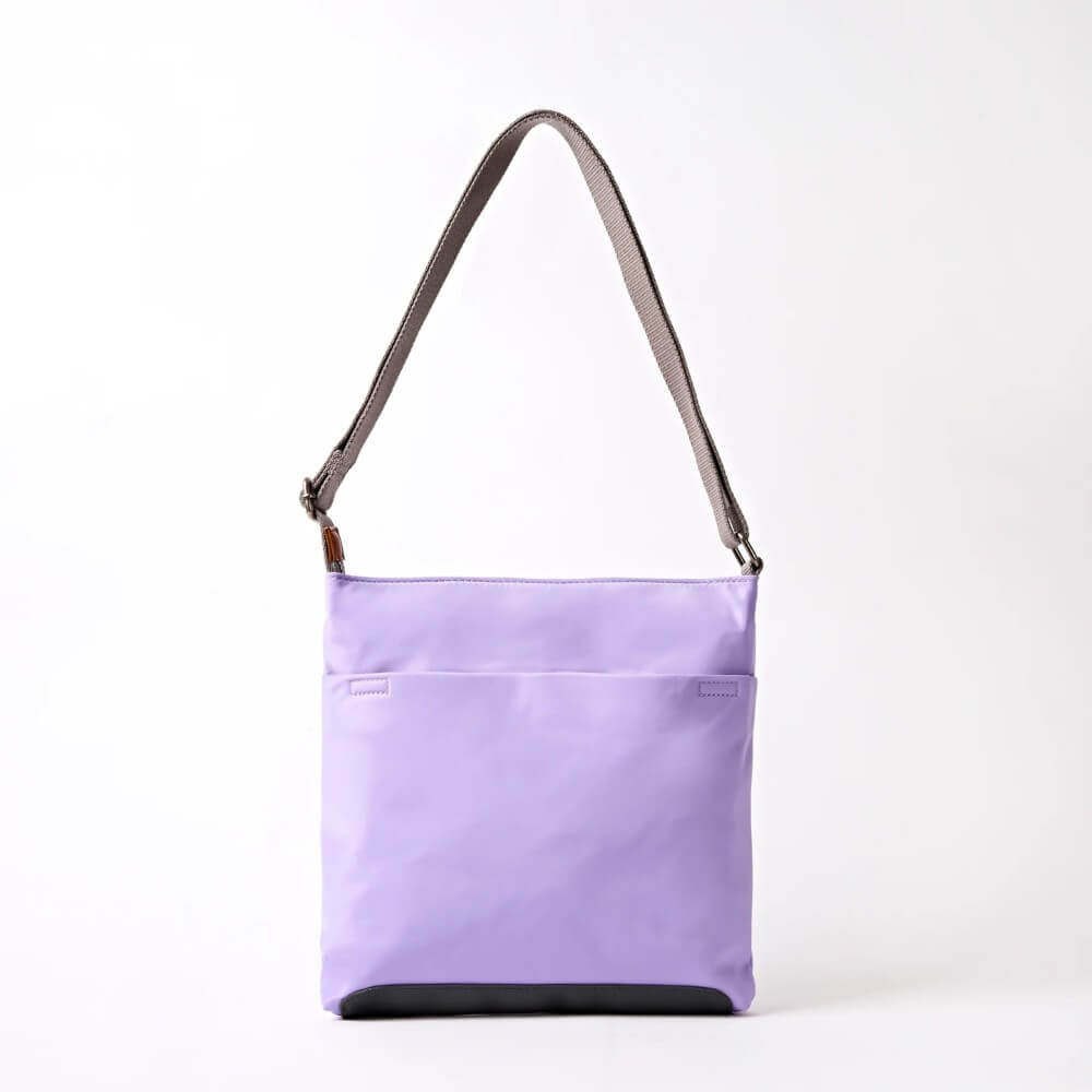Roka Purple shoulder bag with a grey strap on a white background