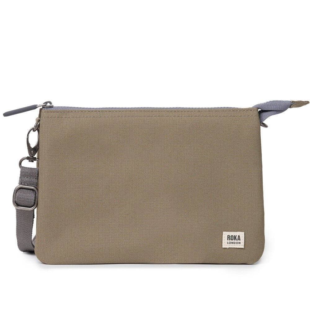 Taupe crossbody bag with grey strap on a white background, featuring Roka London logo.