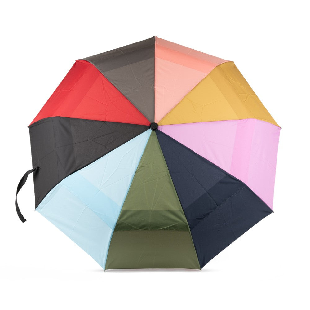 Multicolored umbrella with red, black, orange, yellow, pink, blue, green, and purple sections on a white background.