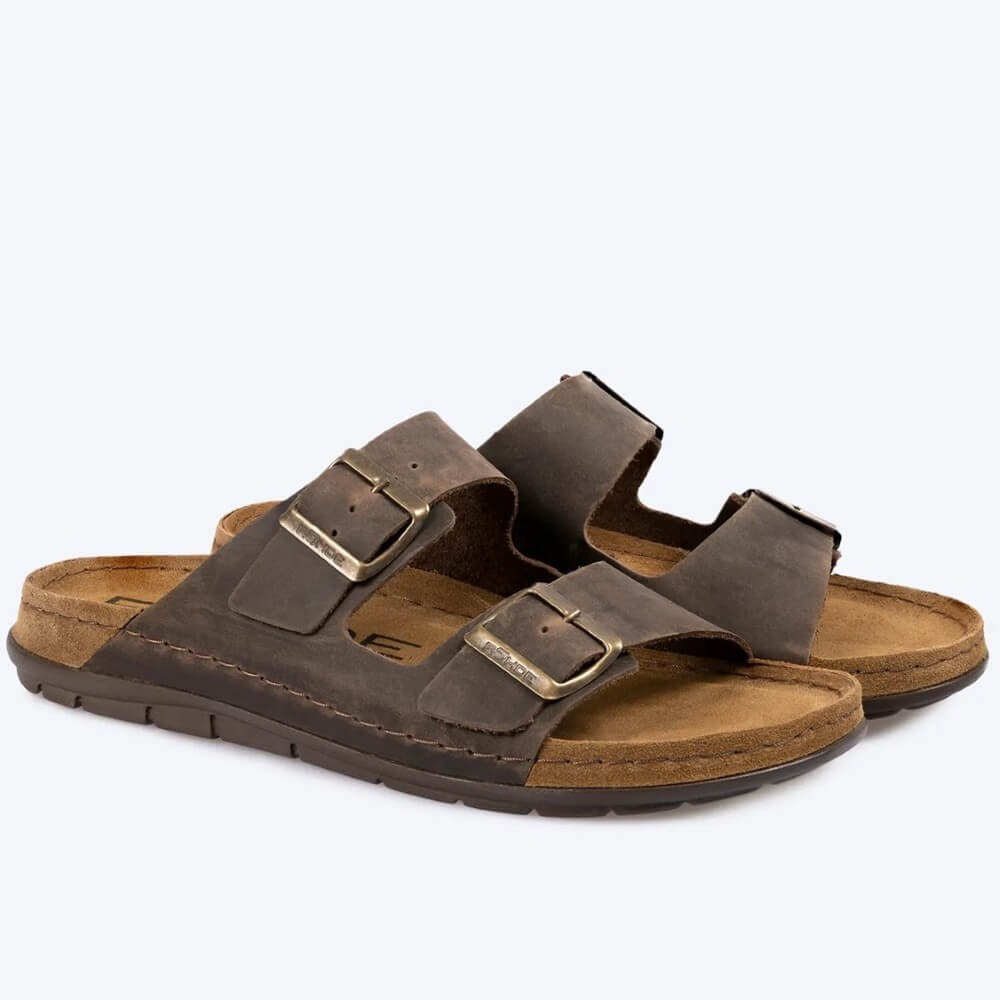 Pair of Rohde brown sandals with buckles on a white background