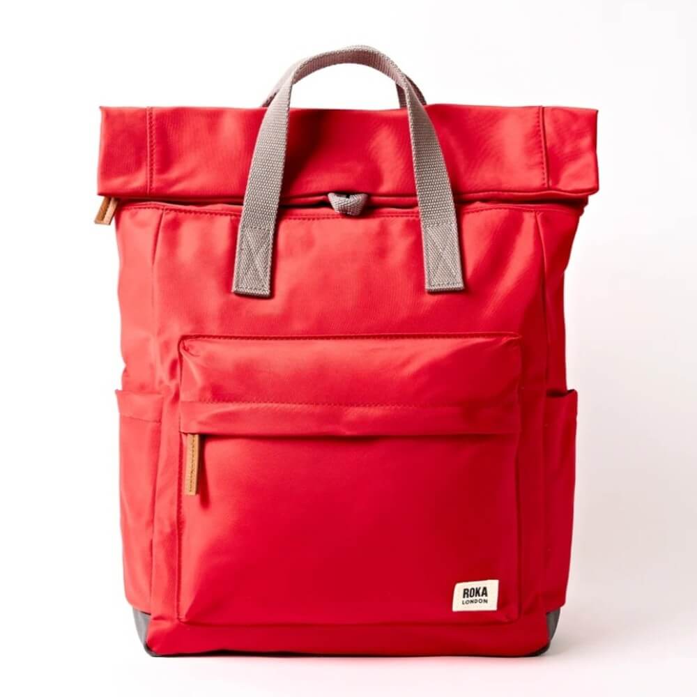 Roka Scarlet Red backpack with grey straps on a white background