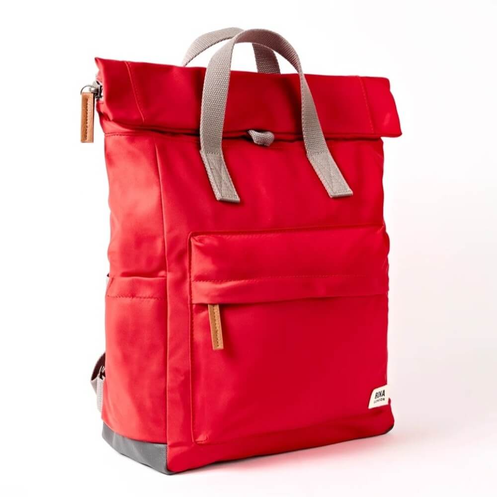 Roka Scarlet Red backpack with grey straps on a white background