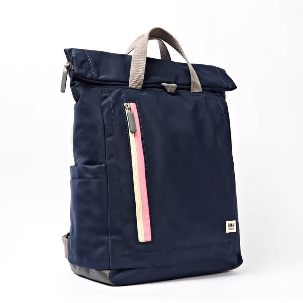 Roka Navy blue backpack with a pink zipper on a white background