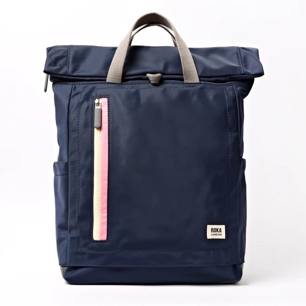 Roka Navy blue backpack with a pink zipper on a white background