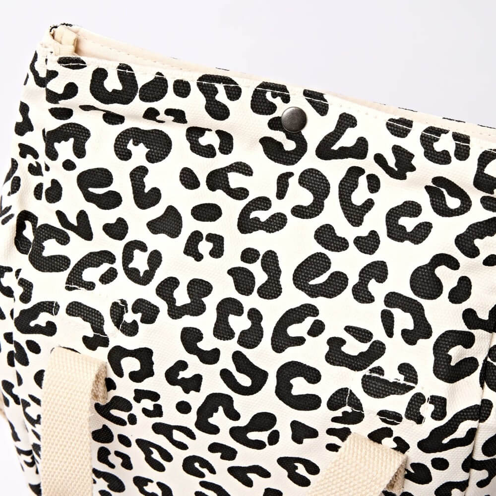 Roka Leopard print pattern on a white background
