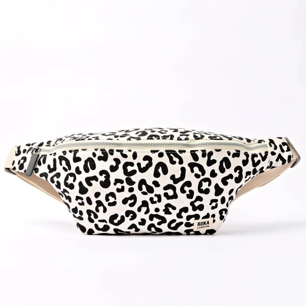 Leopard print fanny pack with 'Roka' branding on a white background