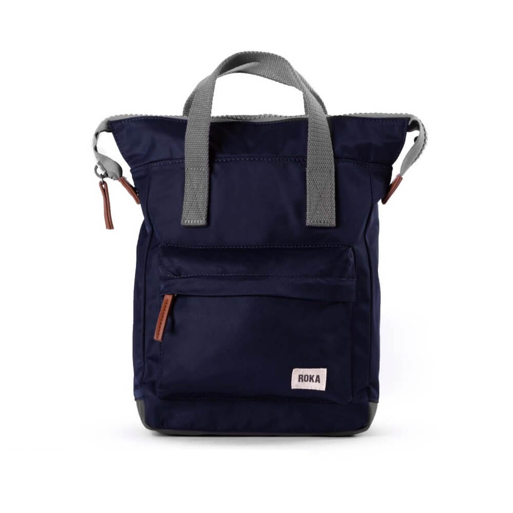 Navy blue backpack with gray straps on a white background