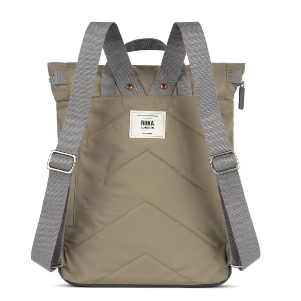taupe backpack with gray straps on a white background