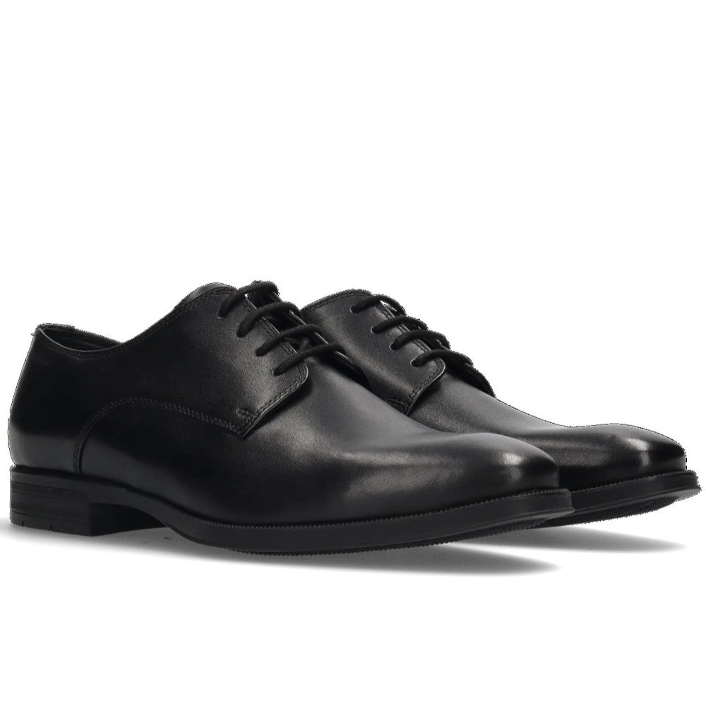 Pair of Salamander Black leather dress shoes on a white background