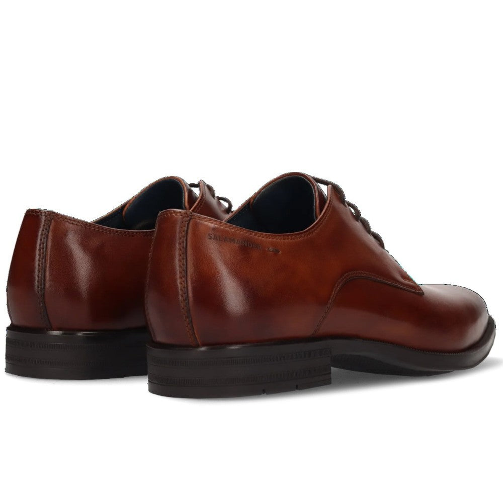 Pair of Salamander Brown leather dress shoes on a white background