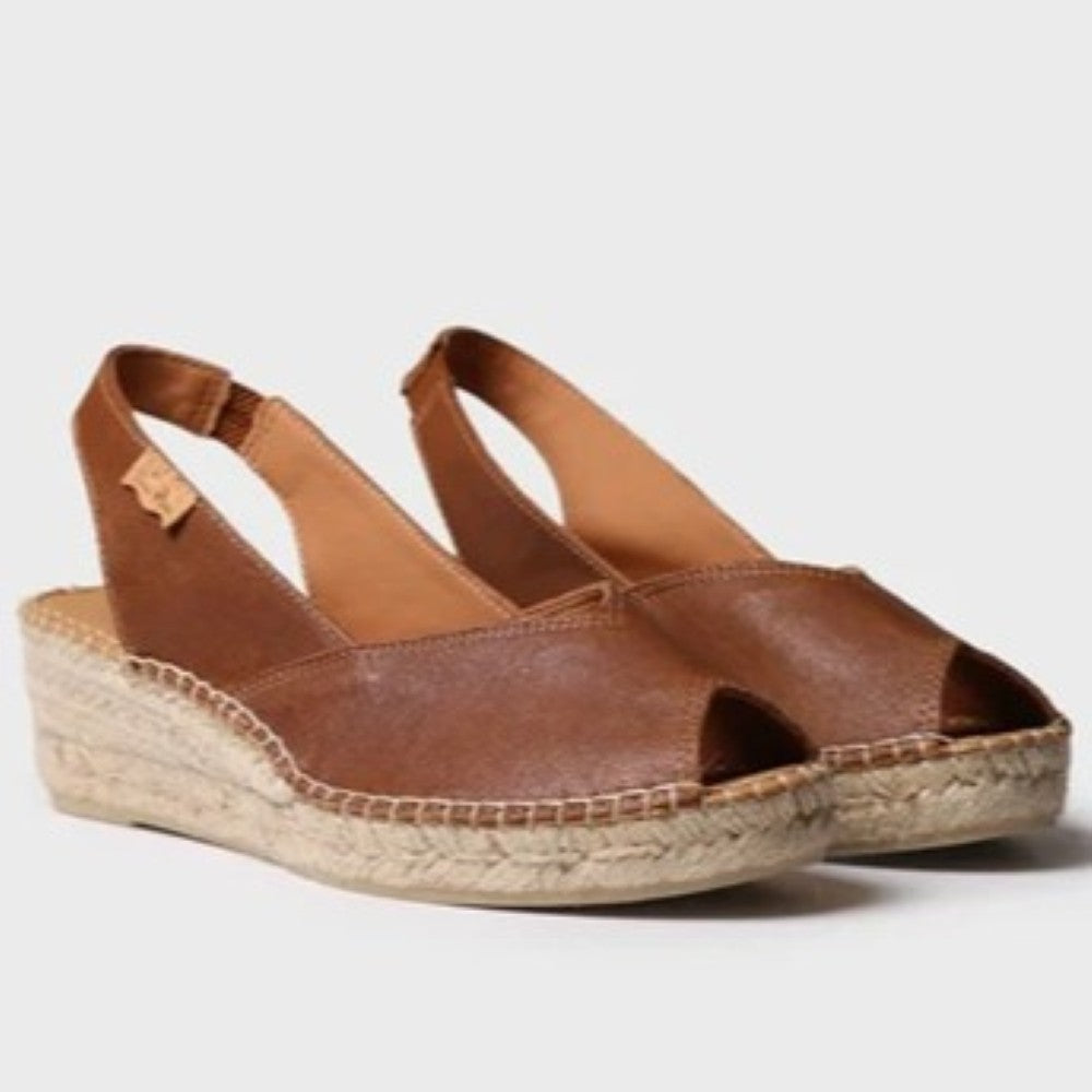 Toni Pons Brown espadrille sandals on a light grey background