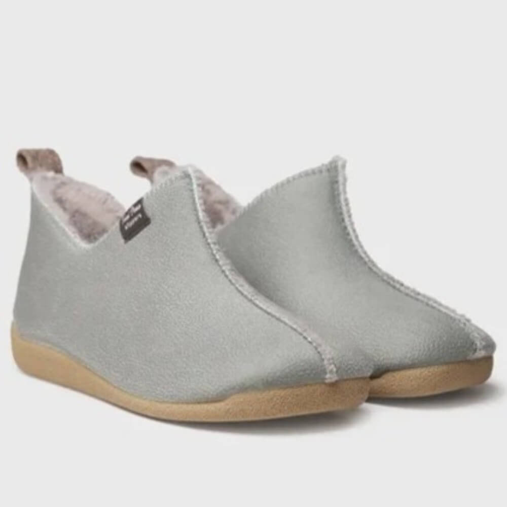 A pair of Toni Pons slip-on slipper shoes in a light gray suede-like material with a soft pink fleece lining and tan soles, shown against a light gray background.