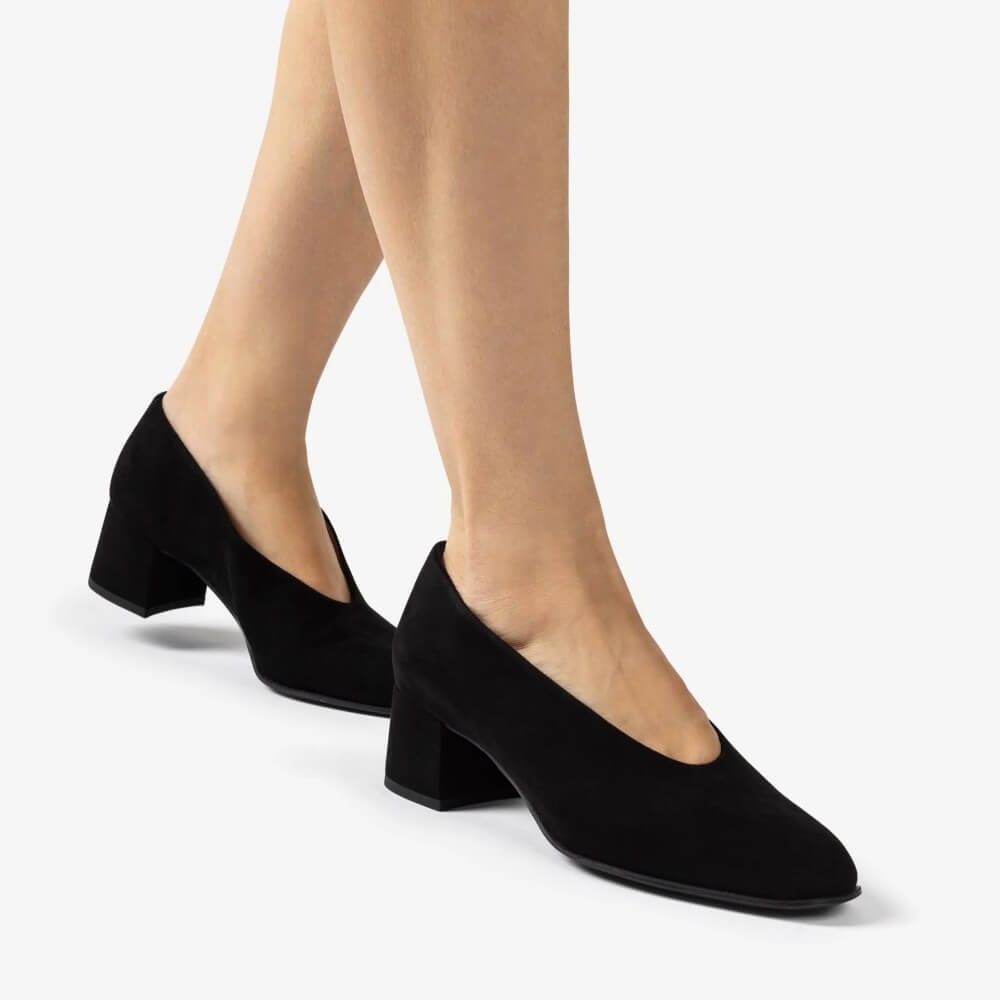 Unisa Black Suede Block heel court shoe worn on a white background