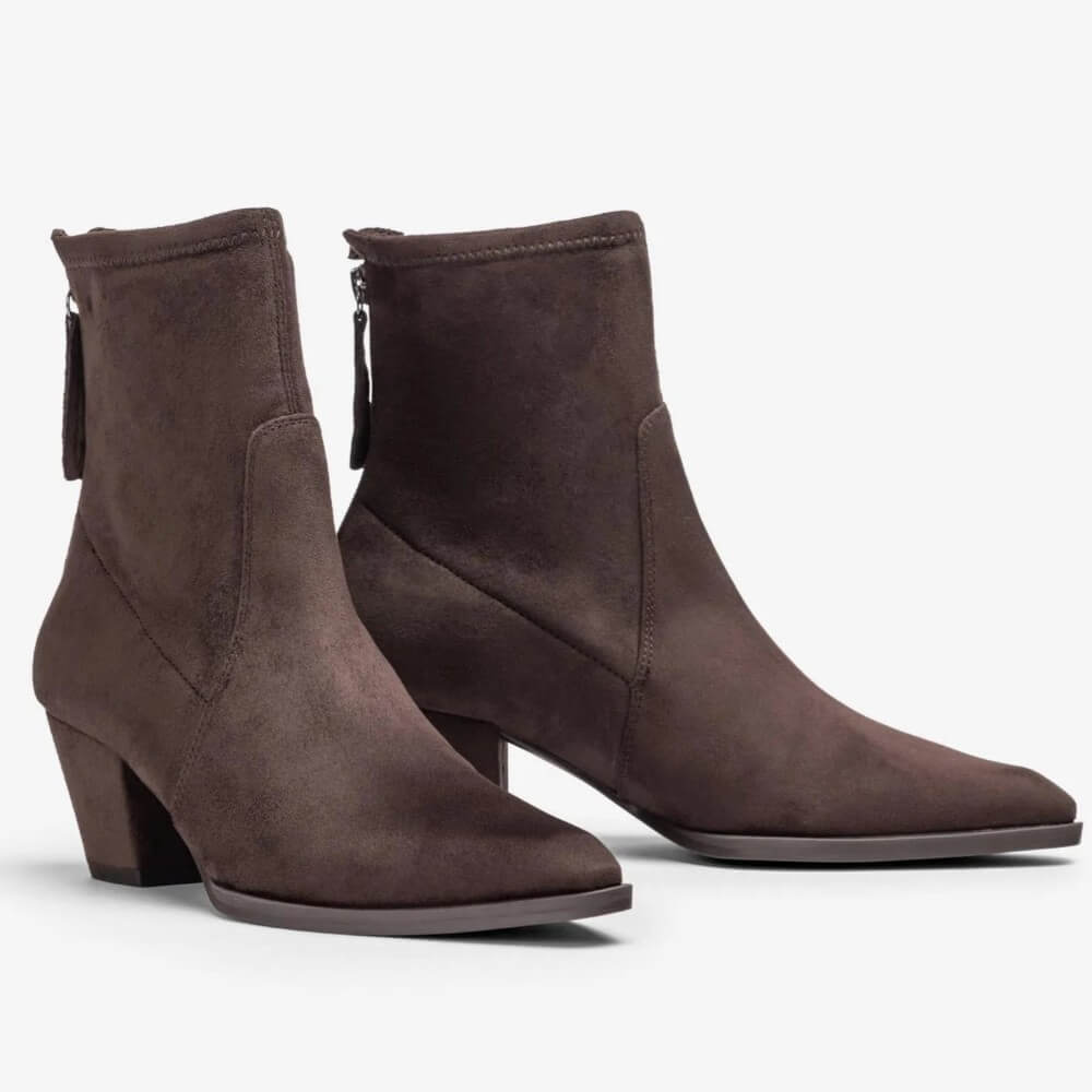 A pair of Unisa dark brown suede ankle boots with low block heels, pointed toes, and back zippers, shown against a plain white background.