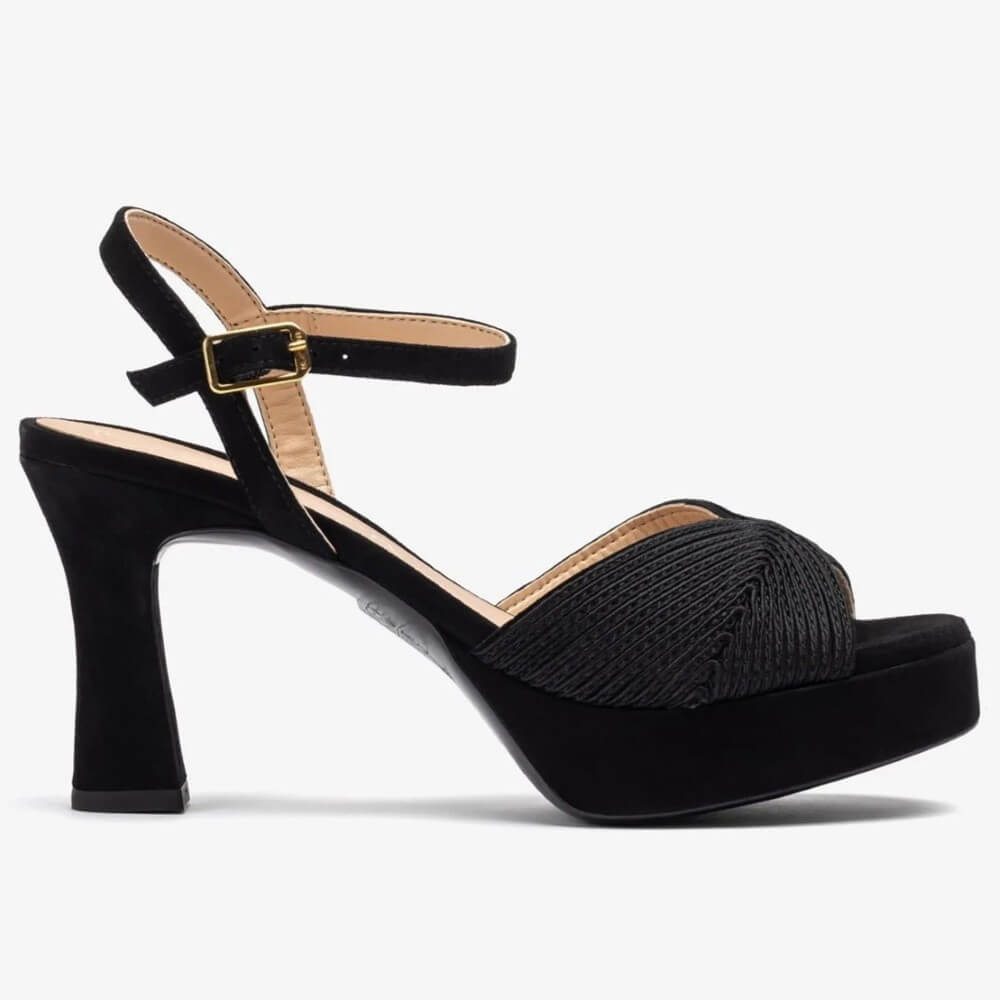 Unisa Black high-heeled sandal with platform sole on a white background