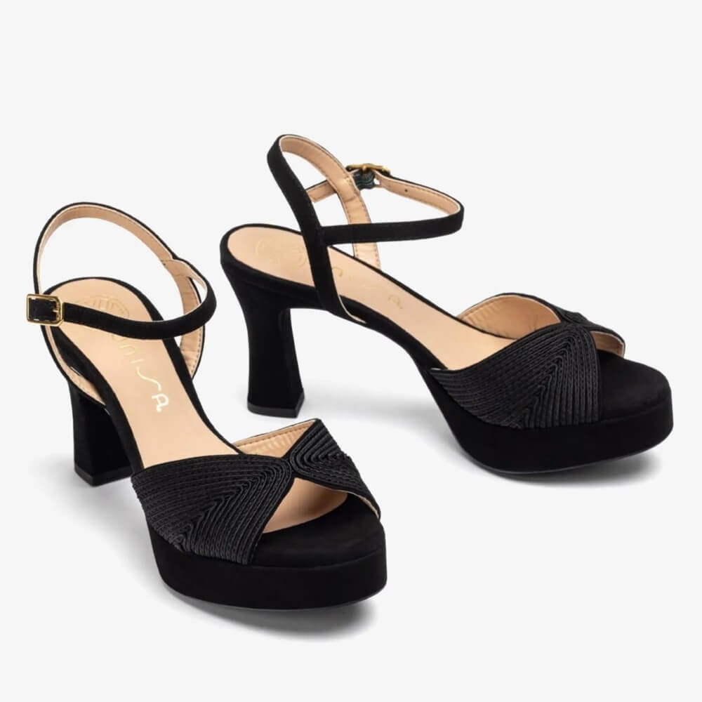 Unisa Black high-heeled sandals with platform sole on a white background
