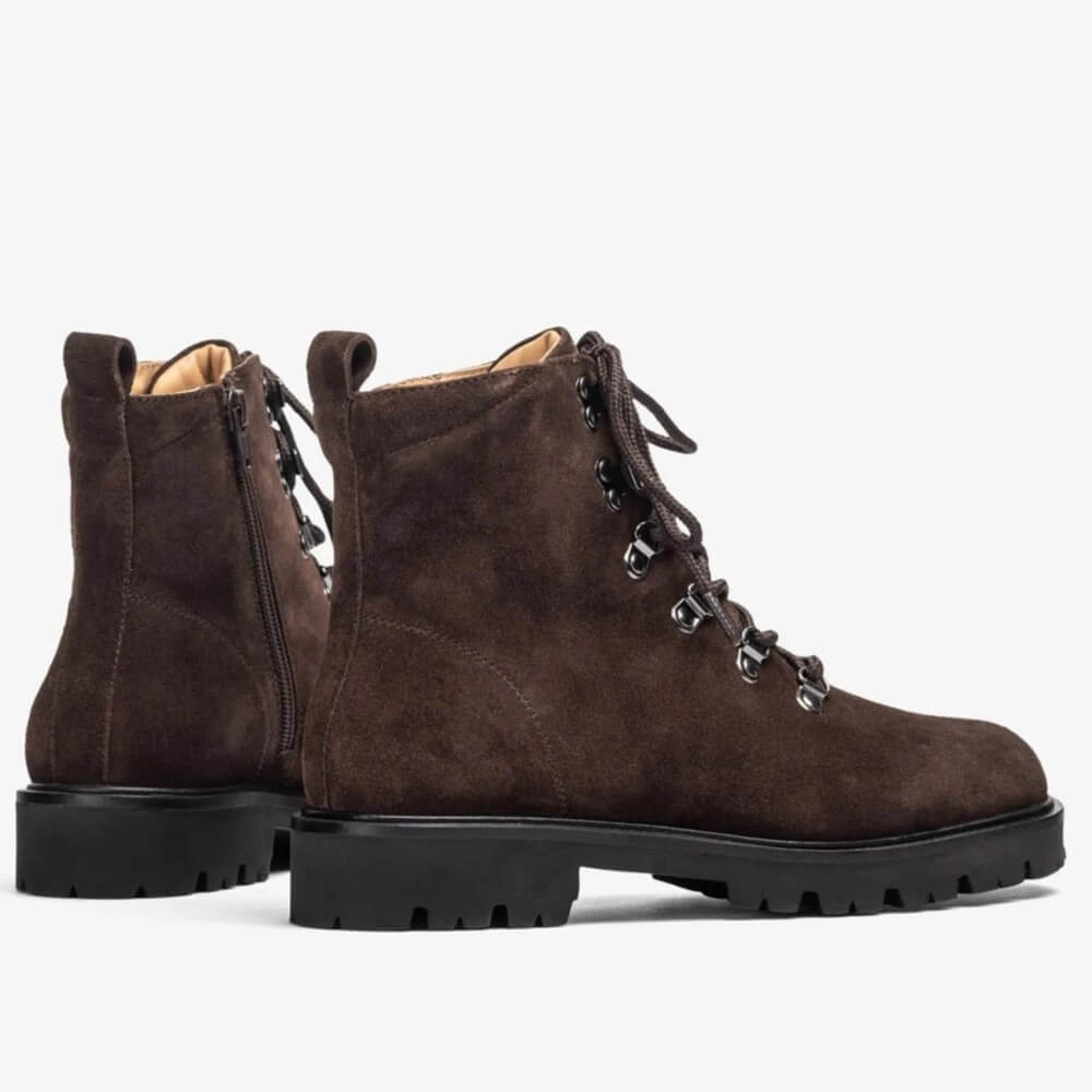 Brown suede boots with black soles on a white background Unisa Fiela Suede Leather Ankle Boot Brown