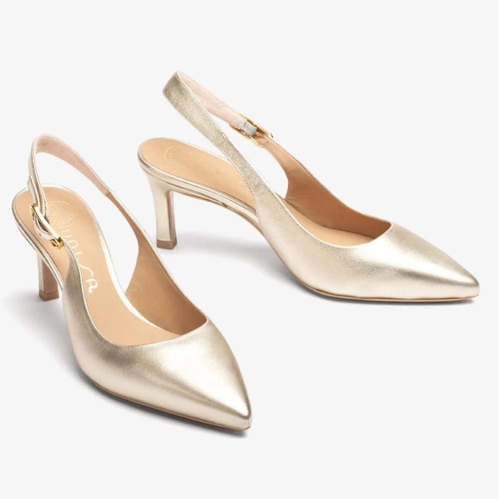 Gold high-heeled shoe on a white background unisa lanz