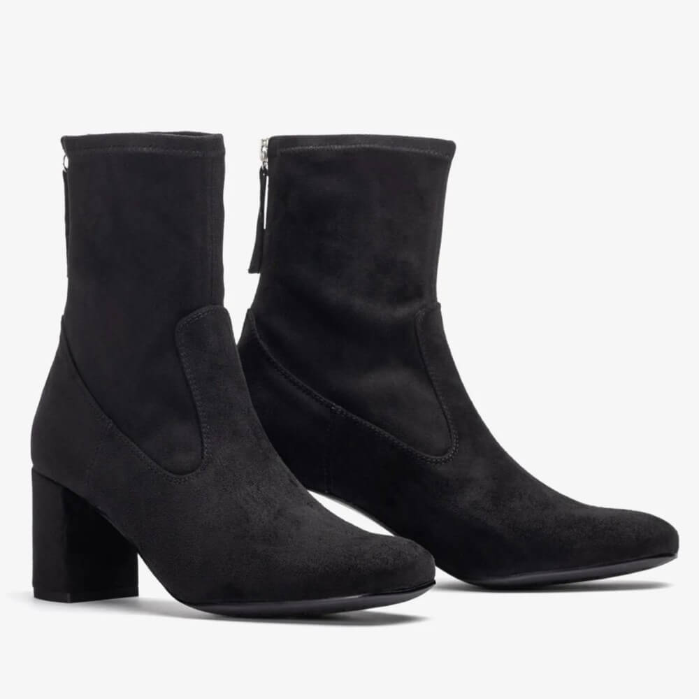 Pair of black ankle boots on a white background Unisa Marvy Square toe ankle boot made in faux suede