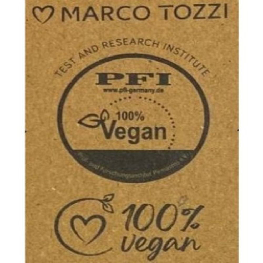A square brown kraft-paper style label or packaging panel with black printed text and logos. The top reads “MARCO TOZZI,” the center shows a circular “PFI 100% Vegan” mark, and the bottom repeats “100% Vegan.