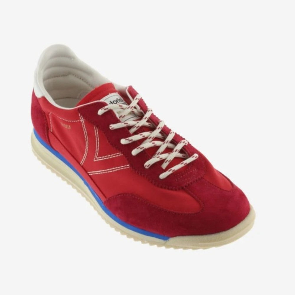 Victoria red trainers on a white background