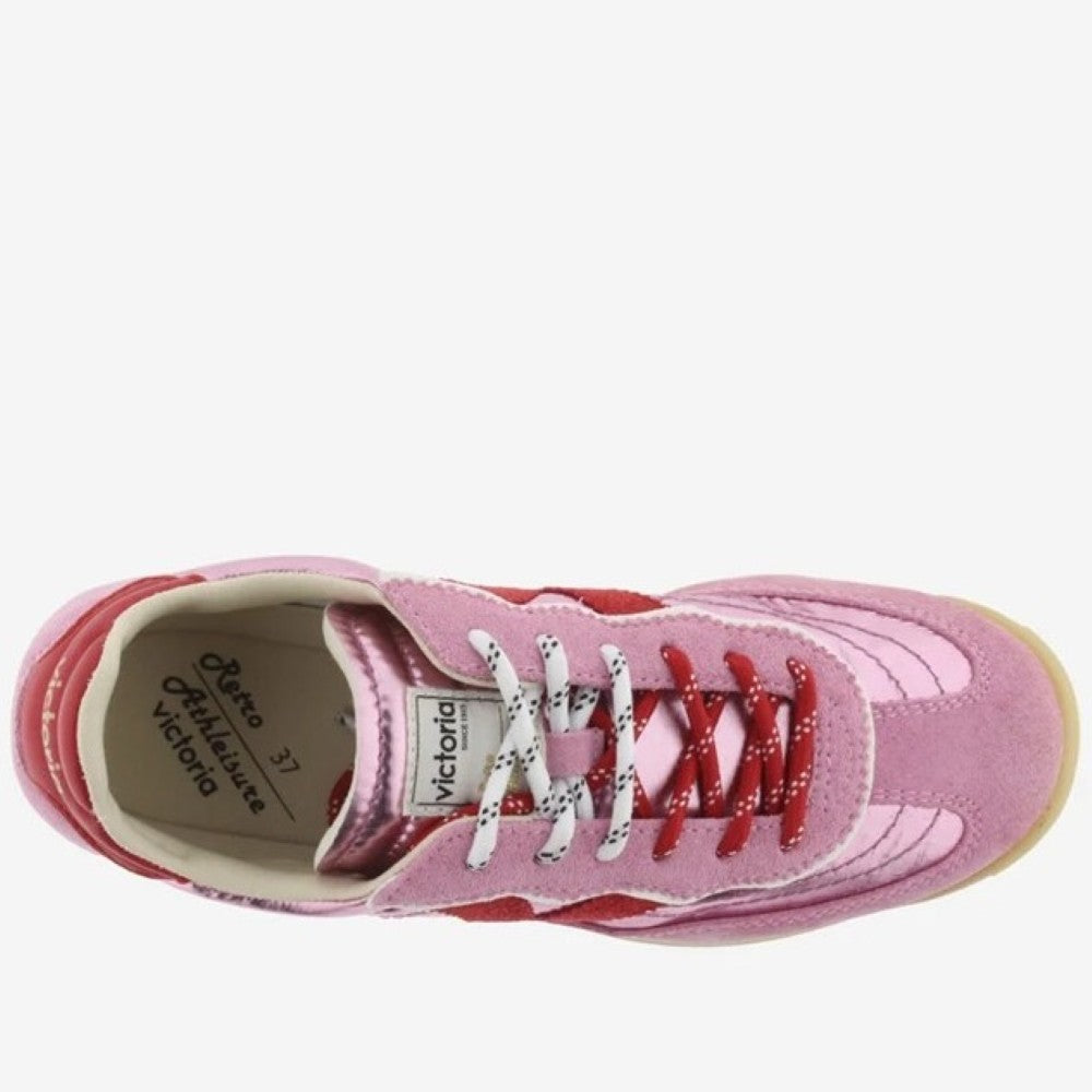 Victoria Rose pink trainer on a white background