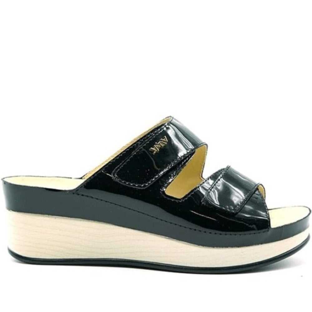 Vital Black patent leather sandal with a white sole on a white background