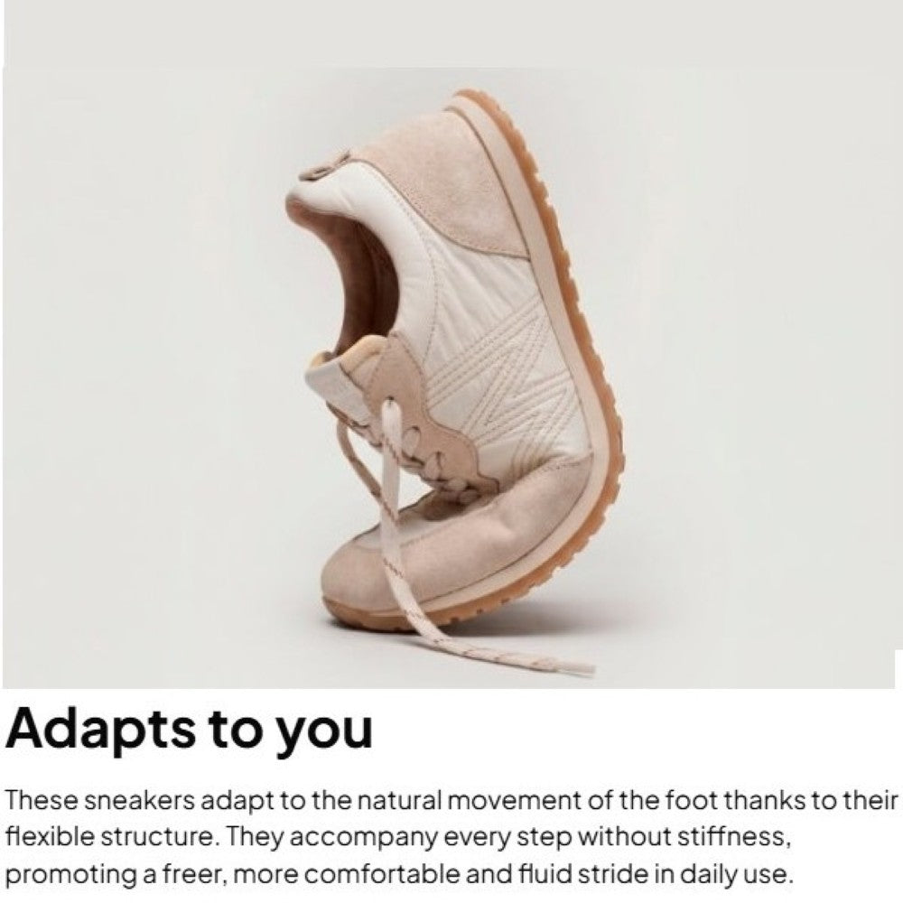 Beige sneaker with text about shoe flexibility on a light gray background