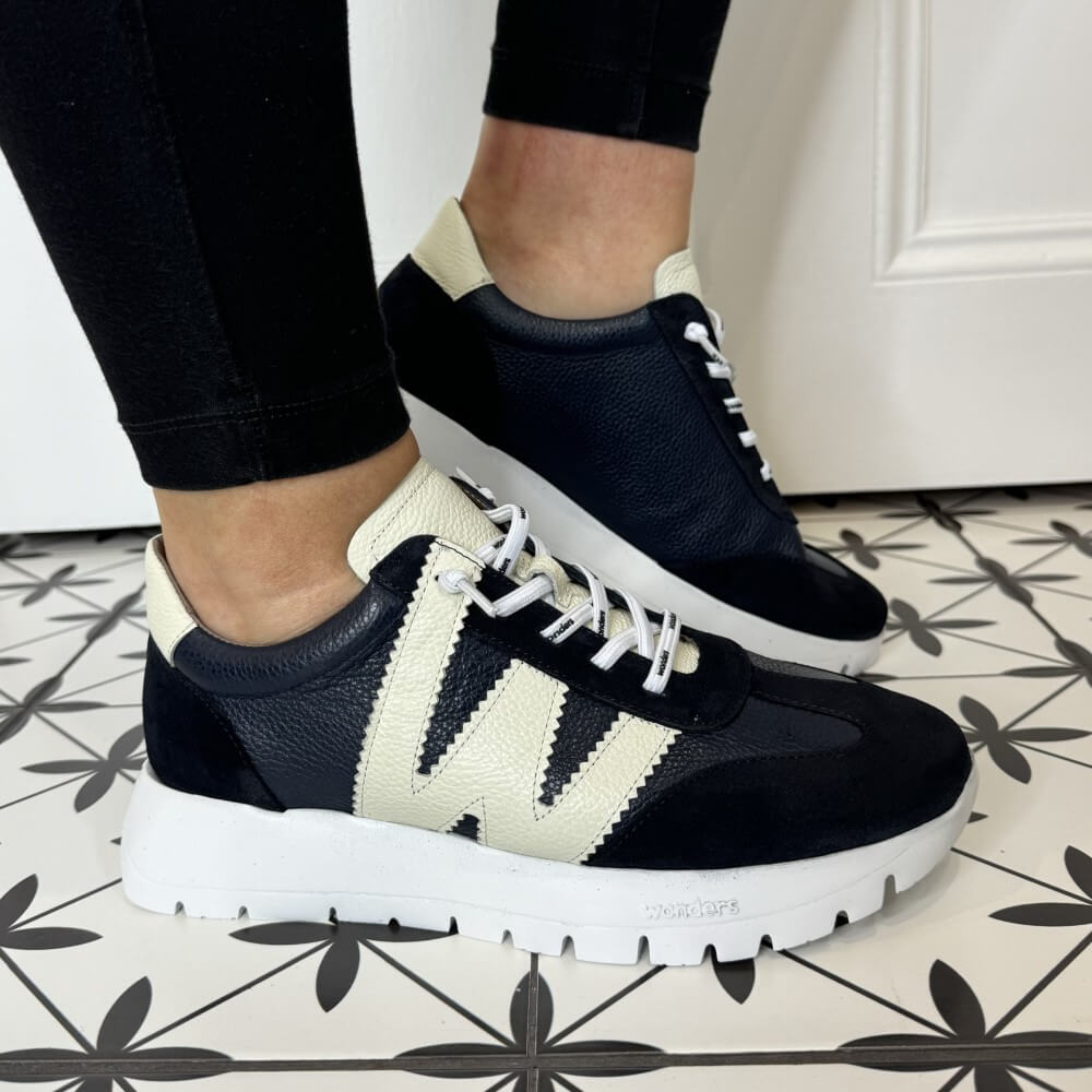 Navy and cream trainers