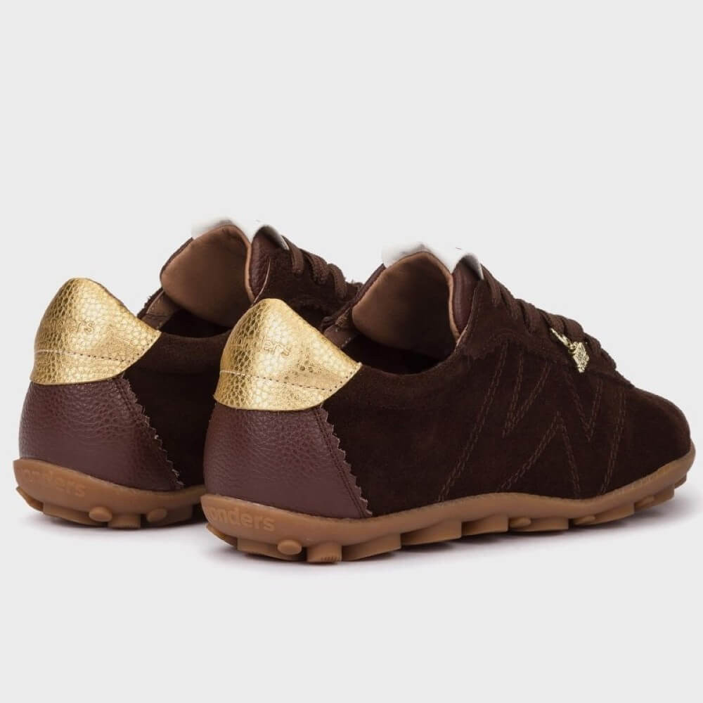 Brown sneakers with gold accents on a white background