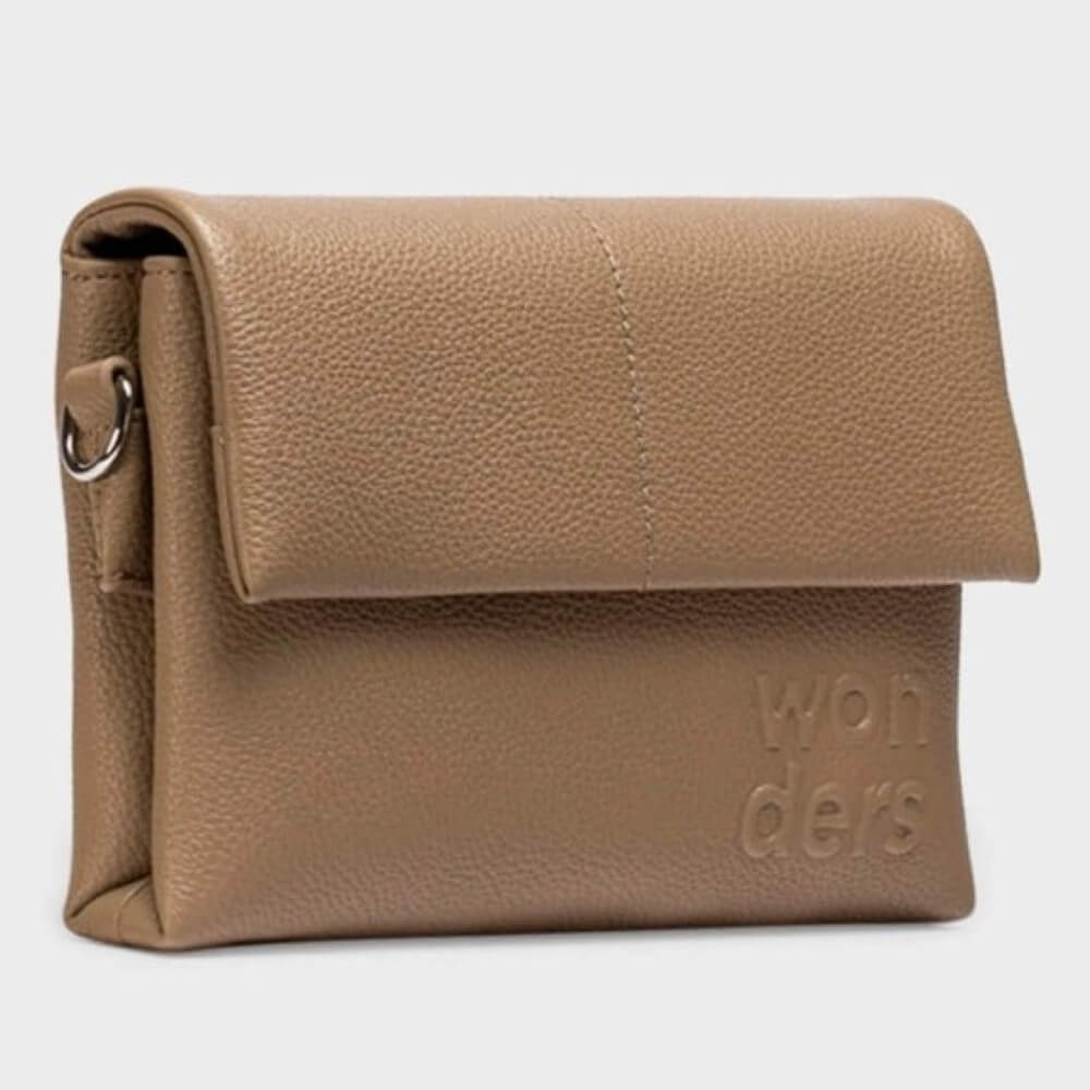 Beige crossbody bag with 'wonders' branding on a light grey background