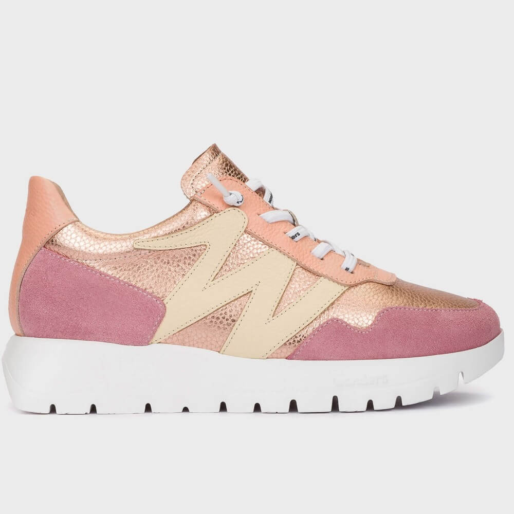 Multicolored sneaker with pink, gold, and beige accents on a light gray background