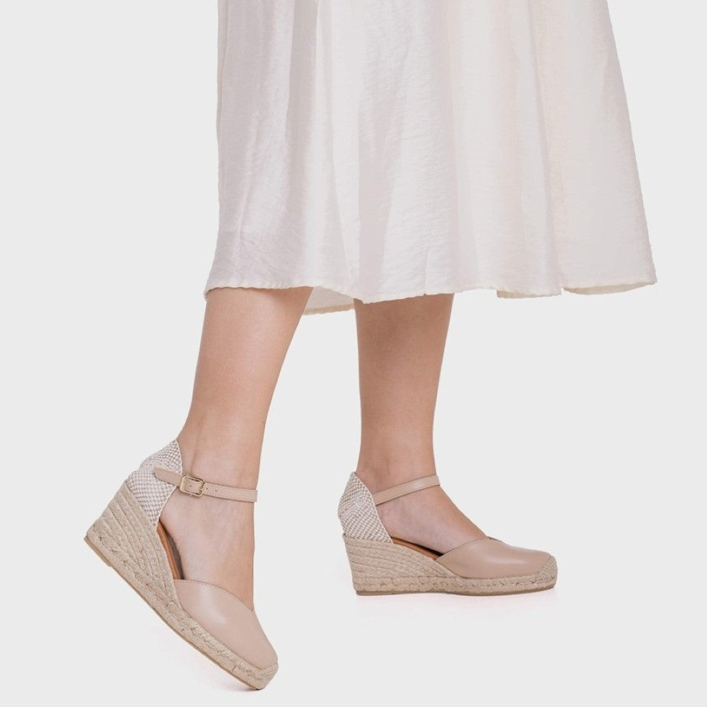 Wonders Beige wedge sandals worn with a light-coloured skirt on a white background