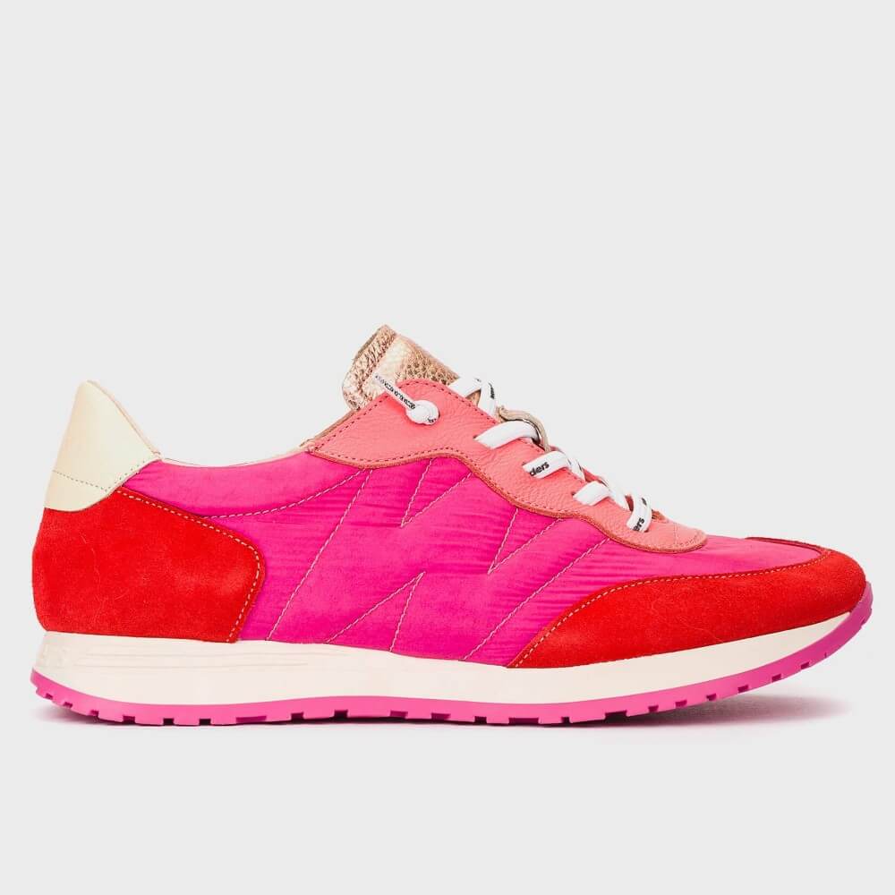 Pink and red sneaker on a light gray background