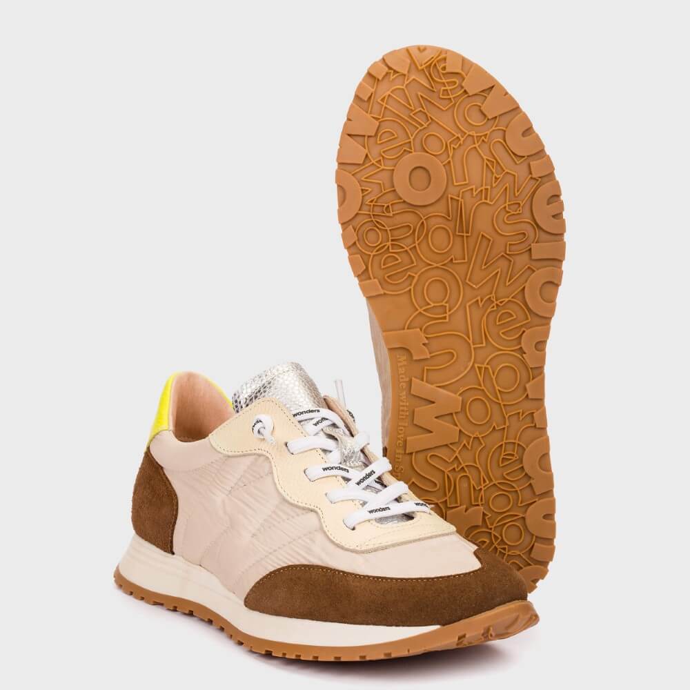 Sneaker with a focus on the sole design on a white background