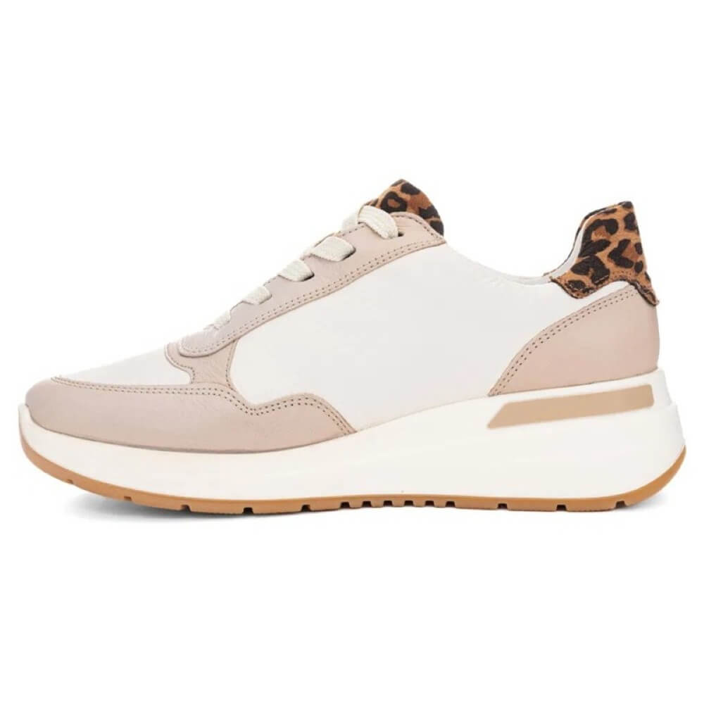 White and beige sneaker with leopard print accents on a white background