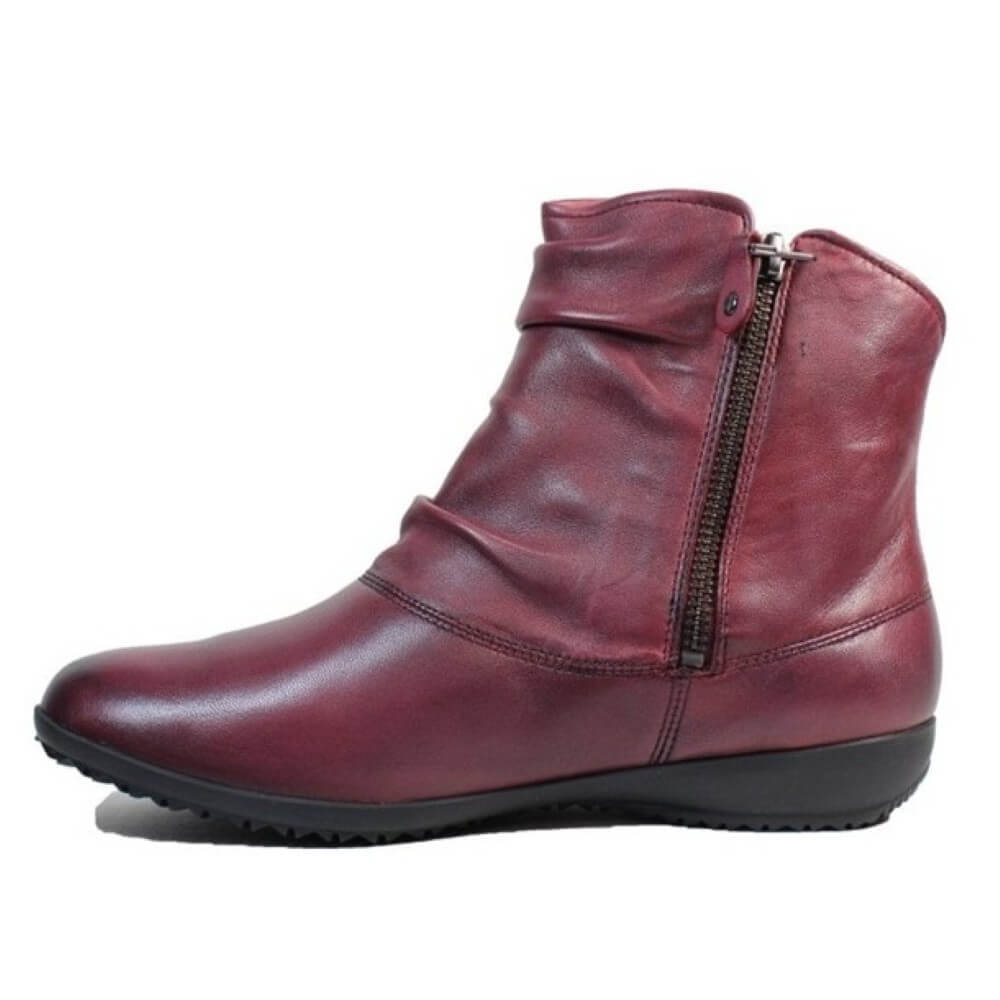 Maroon ankle boot with a zipper on a white background