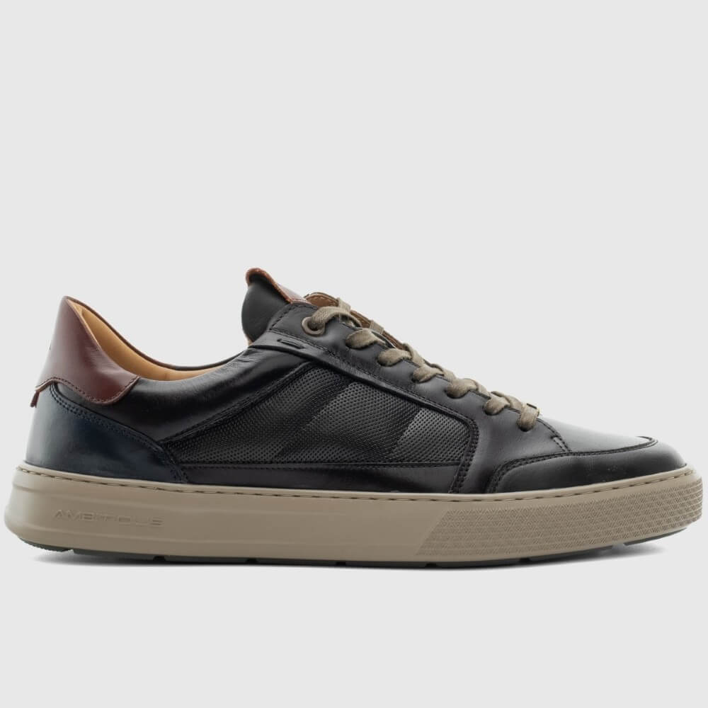 Brown leather sneaker with brown and Kaki accents on a light grey background
